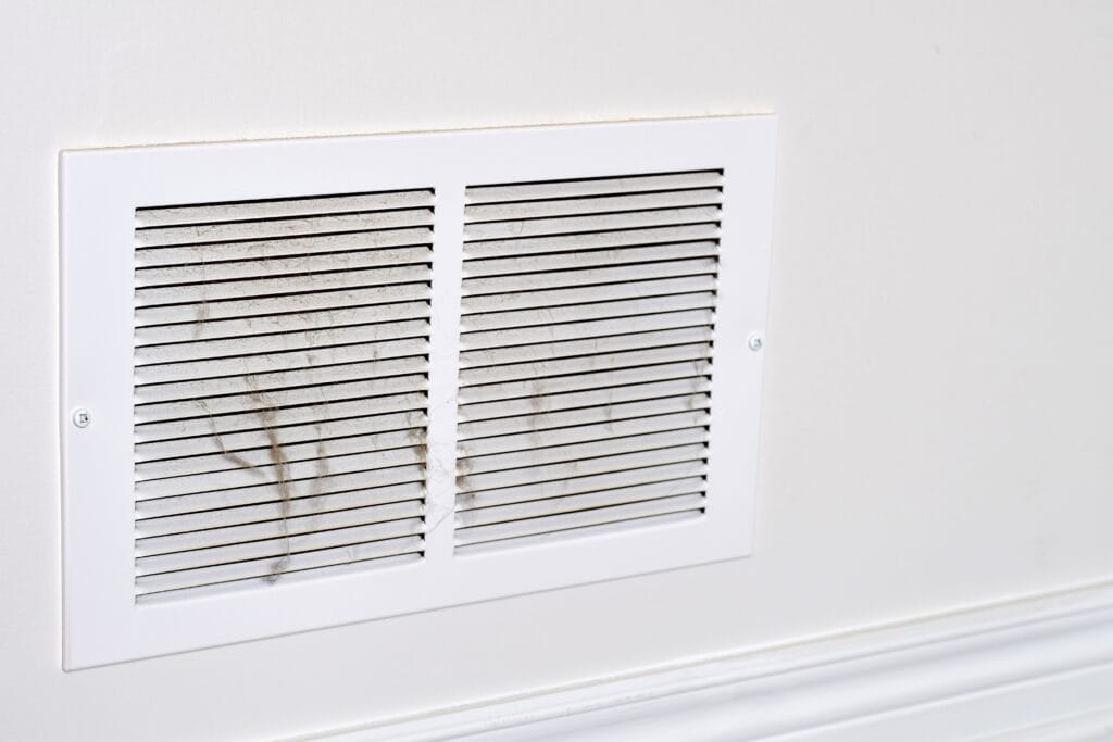 Dirty,Dusty,Return,Vent,Cover,On,A,House,Wall,With poor indoor air quality